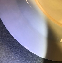 A pair of Chinese famille rose bianco sopra bianco plates, Yongzheng/Qianlong
