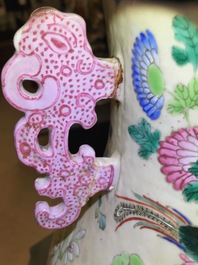 A pair of Chinese famille rose cream-ground butterfly vases, 19th C.