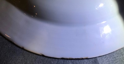 A pair of Chinese famille rose bianco sopra bianco plates, Yongzheng/Qianlong