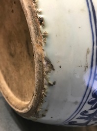 A Chinese blue and white fish bowl with bats and flowers, 19th C.