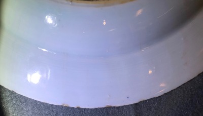 A pair of Chinese famille rose bianco sopra bianco plates, Yongzheng/Qianlong