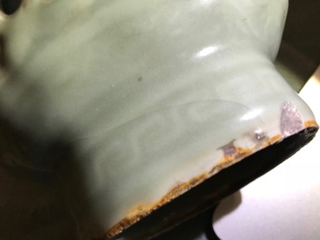 A Chinese celadon-glazed reticulated double-walled vase, 19/20th C.