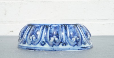 A Chinese blue and white lotus throne-shaped stand, Xuande mark, 19/20th C.