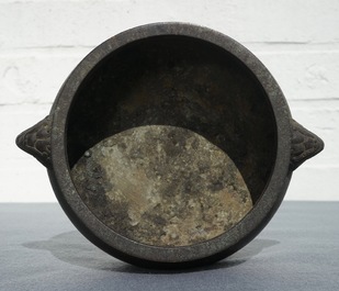 A Chinese bronze incense burner with elephant head handles, qianqing gongbao mark, Ming