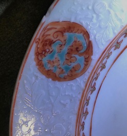 A pair of Chinese famille rose bianco sopra bianco plates, Yongzheng/Qianlong