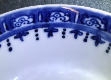 A Chinese famille rose mandarin teapot with cup and saucer, Qianlong