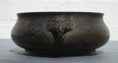 A Chinese bronze incense burner with elephant head handles, qianqing gongbao mark, Ming