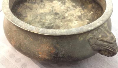 A Chinese bronze incense burner with elephant head handles, qianqing gongbao mark, Ming
