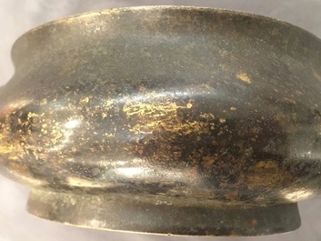 A Chinese bronze incense burner with elephant head handles, qianqing gongbao mark, Ming
