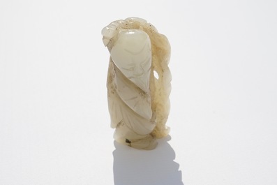 Nine various Chinese jade carvings, 20th C.