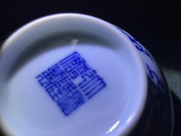 A pair of Chinese iron red and blue cups and a bowl, Qianlong and Guangxu marks, 19/20th C.