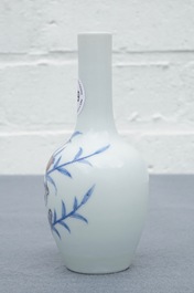 A Chinese blue and underglaze red 'sanduo' vase, Kangxi mark, 19/20th C.