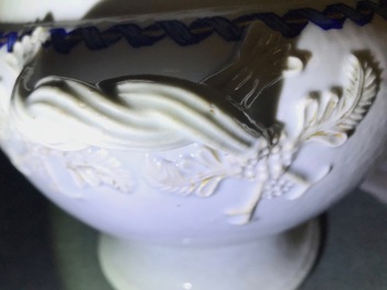 A Chinese export porcelain 'Mysterious urn' tureen and cover on stand, Qianlong/Jiaqing