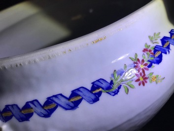 A Chinese export porcelain 'Mysterious urn' tureen and cover on stand, Qianlong/Jiaqing