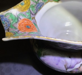 A Chinese famille verte teapot and milk jug, 19th C., and a famille rose cup and saucer, Qianlong