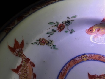 Three Chinese famille verte plates with carps and floral designs, Kangxi