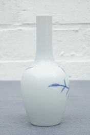 A Chinese blue and underglaze red 'sanduo' vase, Kangxi mark, 19/20th C.