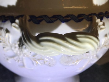 A Chinese export porcelain 'Mysterious urn' tureen and cover on stand, Qianlong/Jiaqing