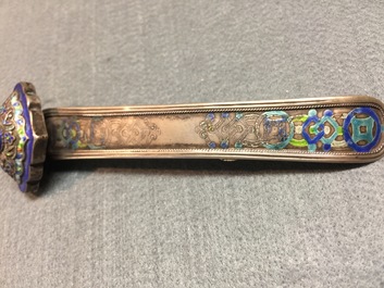 Twenty Chinese kingfisher feather ornaments in silver, jade, coral and gilt metal, Qing and 20th C.