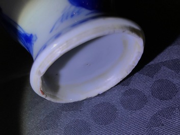 A pair of Chinese blue and white miniature vases and covers or tea caddies, Kangxi