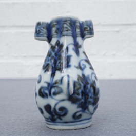 A Chinese blue and white birdfeeder shaped as an arrow vase, Xuande mark, Ming or later
