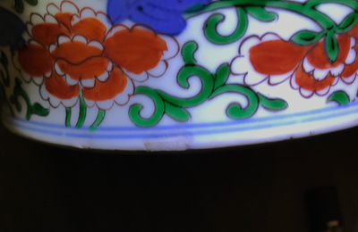 A Chinese wucai vase with mythical beasts, 19th C.