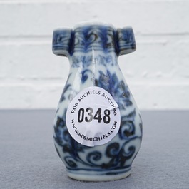 A Chinese blue and white birdfeeder shaped as an arrow vase, Xuande mark, Ming or later
