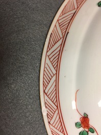 Two Chinese famille verte and Imari-style plates and four cups and saucers, Kangxi and later