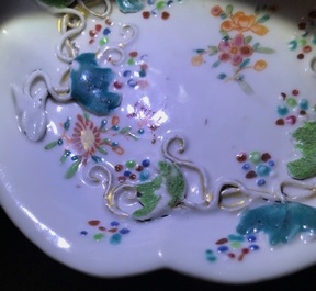 Two Chinese famille rose tea caddies and a relief-decorated cup and saucer, Yongzheng/Qianlong