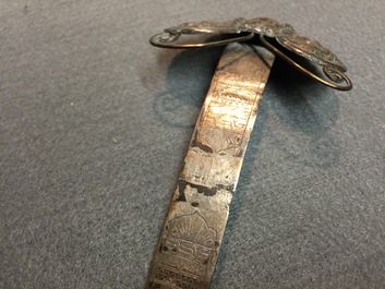 Twenty Chinese kingfisher feather ornaments in silver, jade, coral and gilt metal, Qing and 20th C.