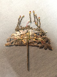 Twenty Chinese kingfisher feather ornaments in silver, jade, coral and gilt metal, Qing and 20th C.