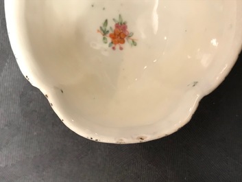 Two Chinese famille rose tea caddies and a relief-decorated cup and saucer, Yongzheng/Qianlong