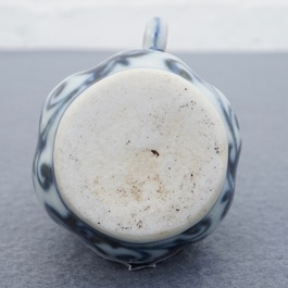 A Chinese blue and white birdfeeder shaped as an arrow vase, Xuande mark, Ming or later