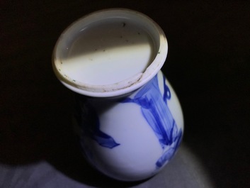 A pair of Chinese blue and white miniature vases and covers or tea caddies, Kangxi