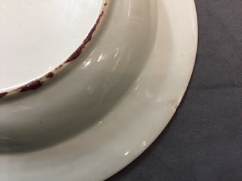 Eight Chinese famille rose plates, a teapot and a sauce boat, Qianlong