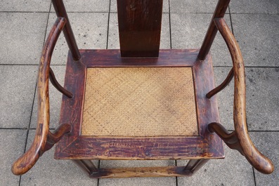 A Chinese elm wood "official's hat" armchair, 19th C.