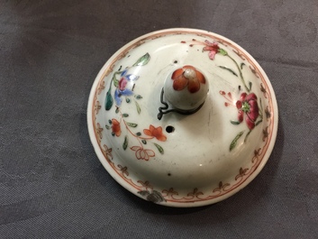 Eight Chinese famille rose plates, a teapot and a sauce boat, Qianlong