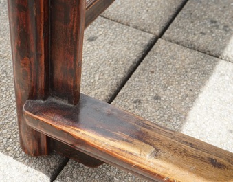 A Chinese elm wood "official's hat" armchair, 19th C.