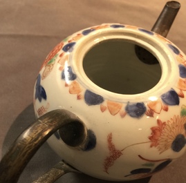 A Chinese famille verte dish, a mandarin bowl, two teapots and three cups, Kangxi and later