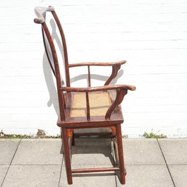 A Chinese elm wood "official's hat" armchair, 19th C.