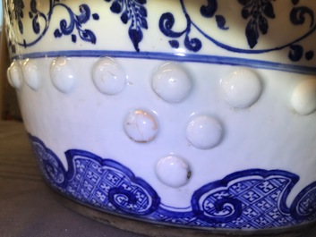 A Chinese blue and white 'lotus scroll' garden seat, Qianlong