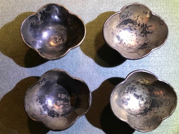 Five Chinese quatrefoil silver and lac burgaute saucers and four cups, 17/18th C.