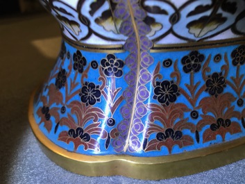 A pair of Chinese parcel-gilt cloisonn&eacute; vases on wooden stands, 1st half 20th C.