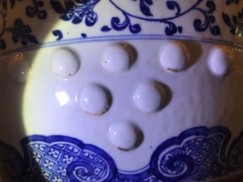 A Chinese blue and white 'lotus scroll' garden seat, Qianlong