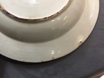 Eight Chinese famille rose plates, a teapot and a sauce boat, Qianlong