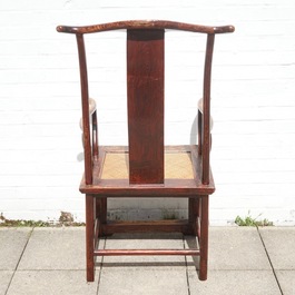 A Chinese elm wood "official's hat" armchair, 19th C.