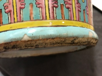 A pair of Chinese famille rose blue-ground vases, 19th C.