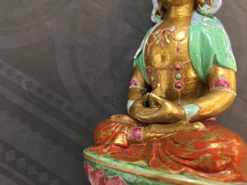 A Chinese parcel-gilt famille rose model of Buddha, 19th C.