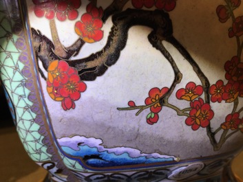 A pair of Chinese parcel-gilt cloisonn&eacute; vases on wooden stands, 1st half 20th C.