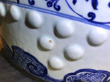 A Chinese blue and white 'lotus scroll' garden seat, Qianlong